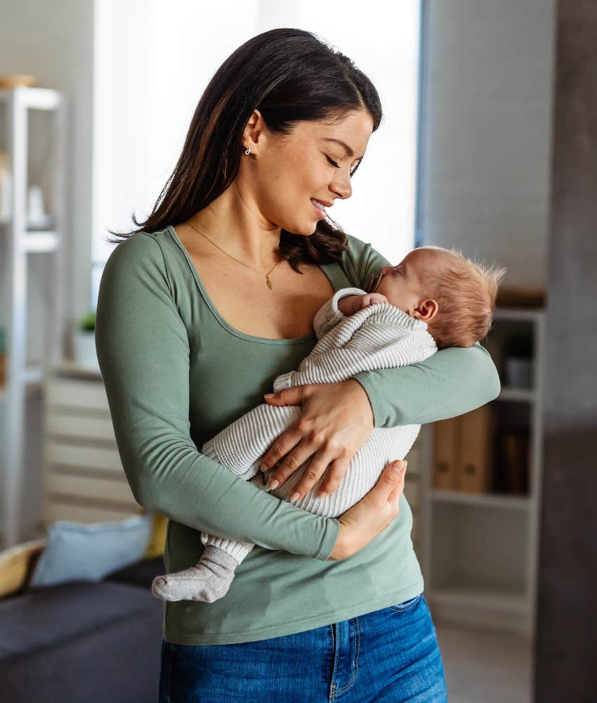 family member visiting with newborn