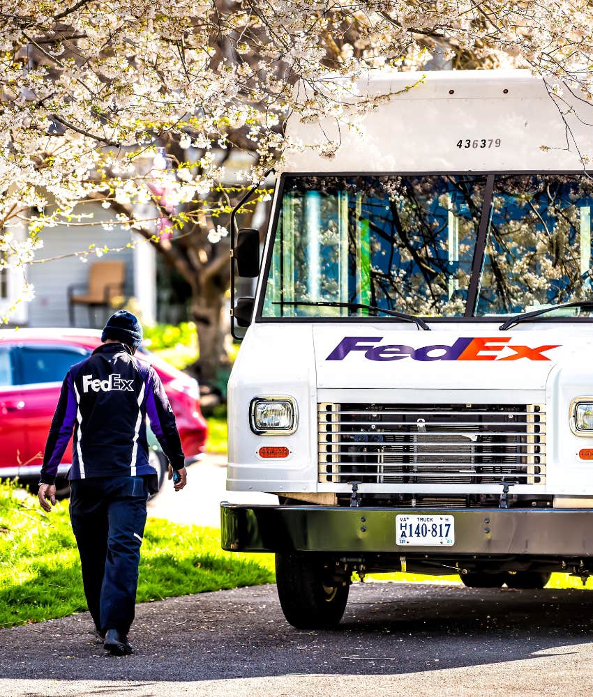 FedEx driver walking back to truck