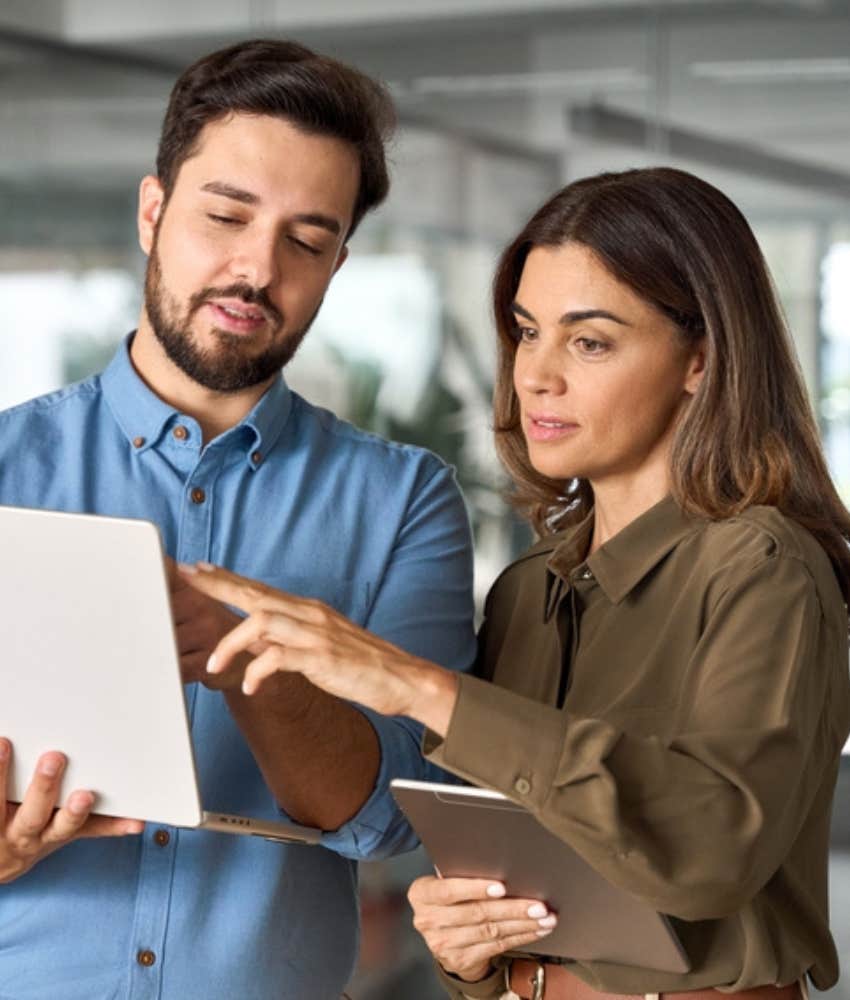 female worker speaking with male colleague