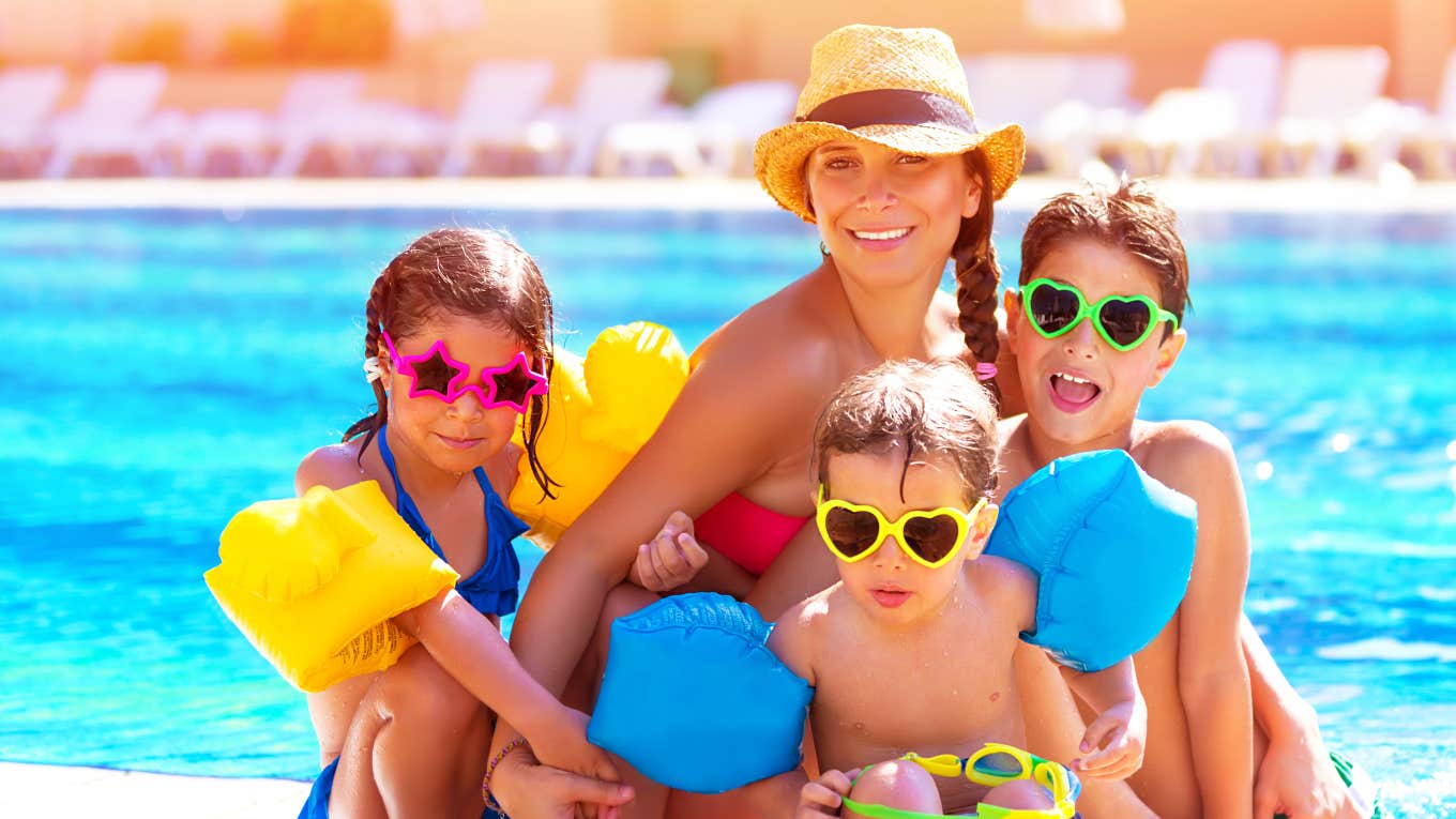 mom with three kids at pool