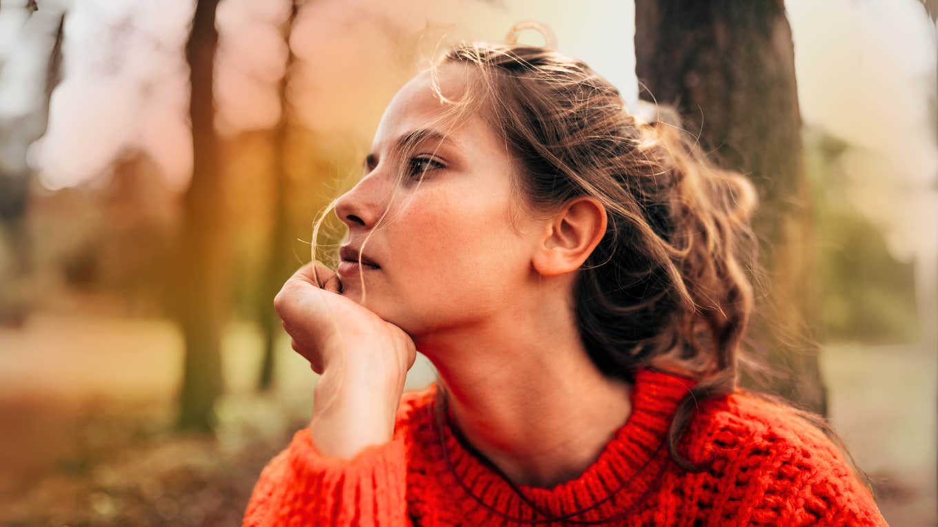 Pensive woman getting through the first days of a major crisis.