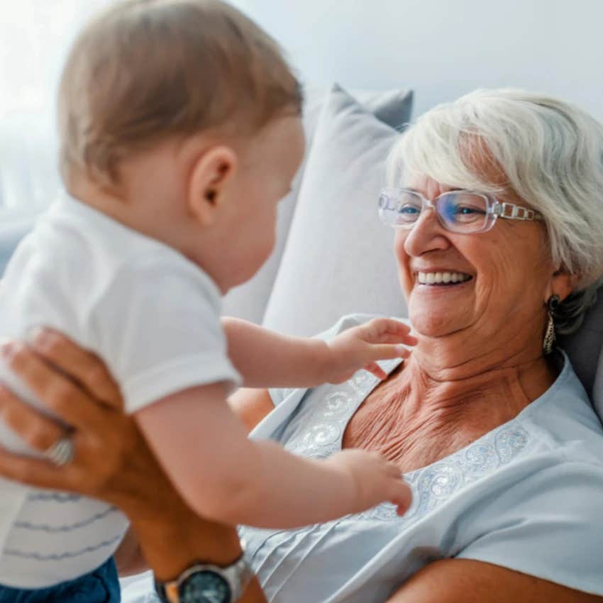 Grandma holding her grandchild