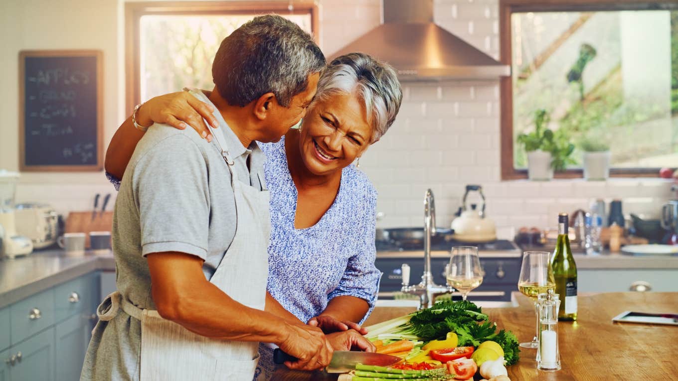 Woman and man cook together and man is falling for her because of her green flags.