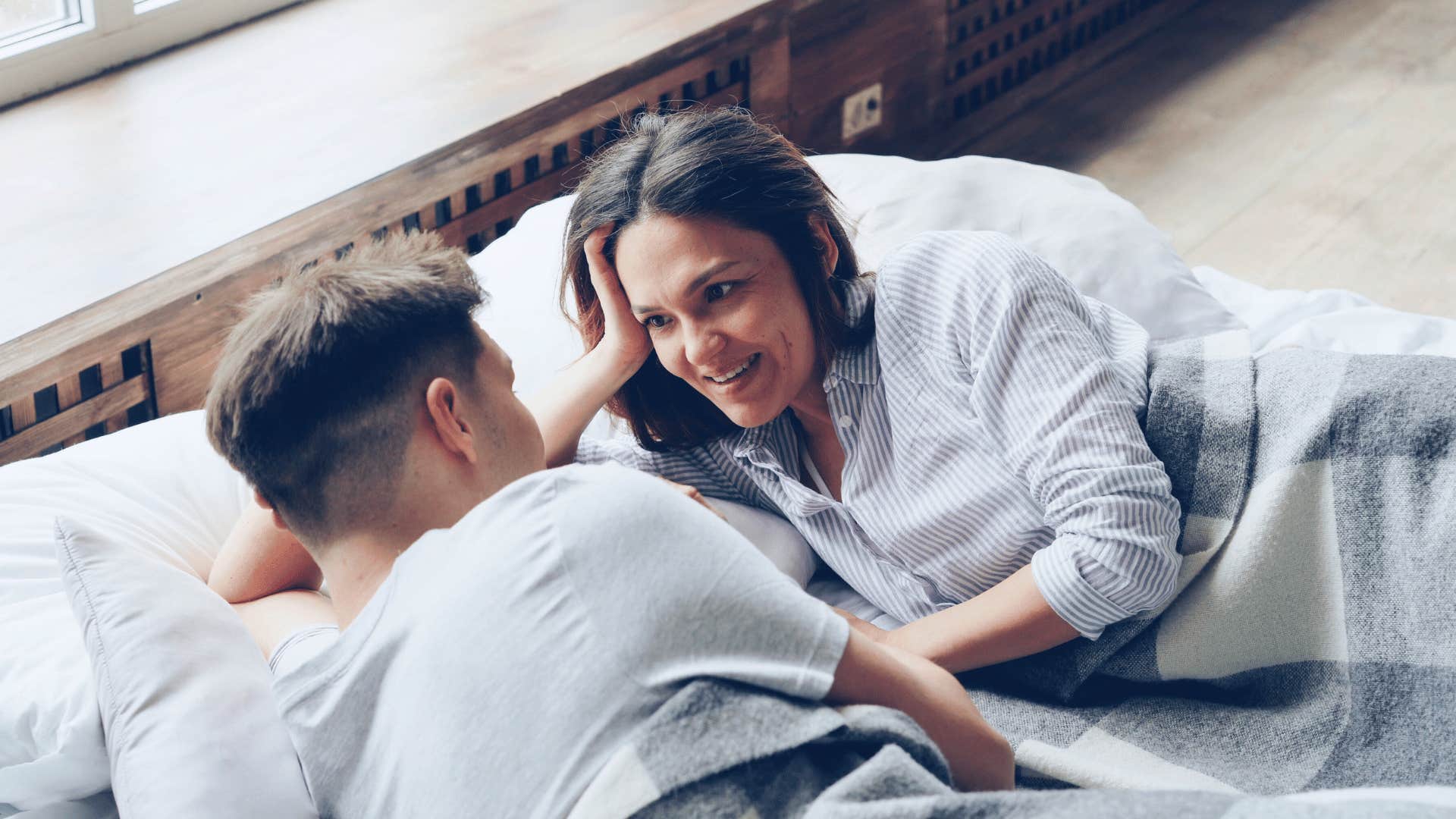 Couple talking closely, working on being happier 