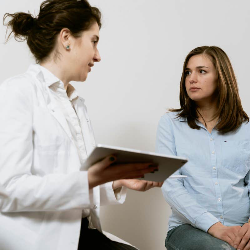 woman talking to doctor