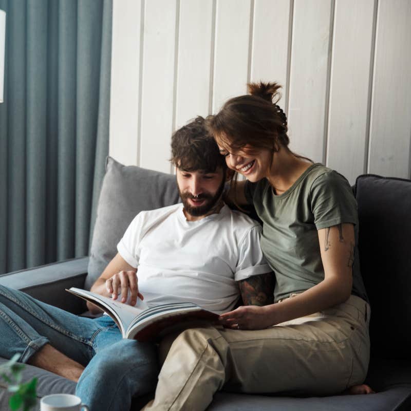 couple reading together on couch