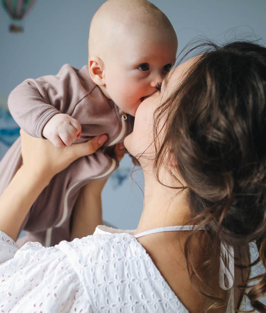 mom holding infant