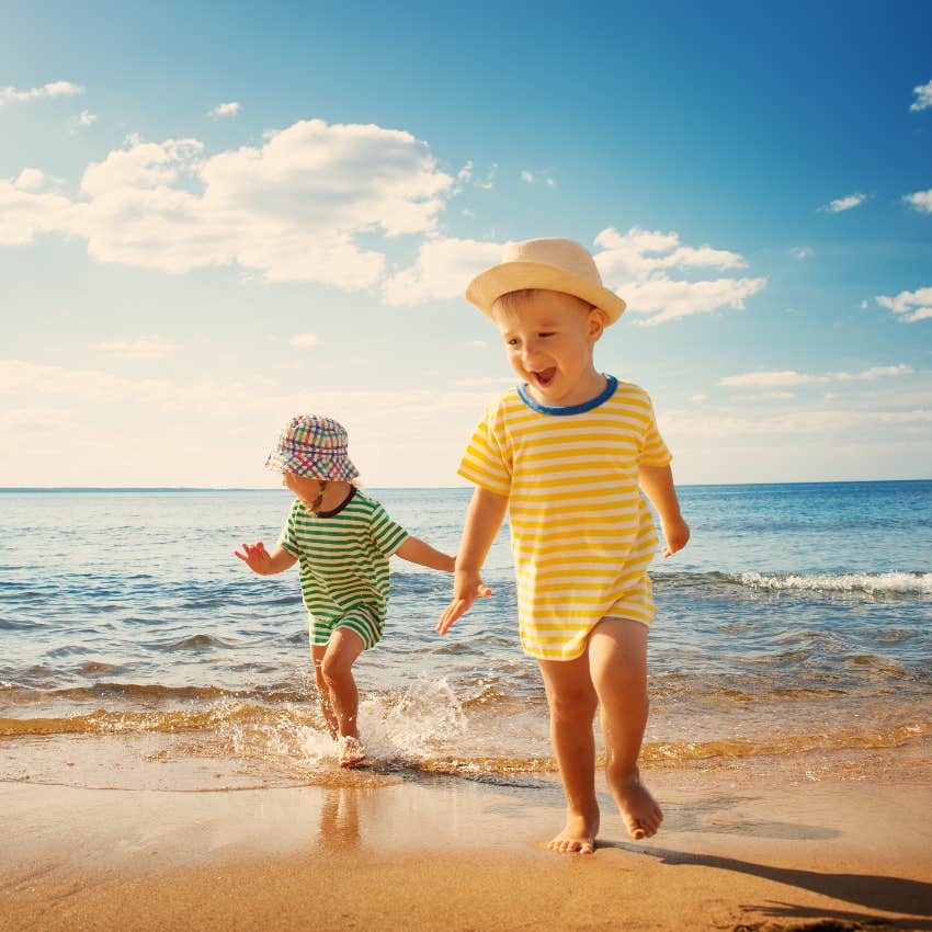 Kids playing in the water at the beach