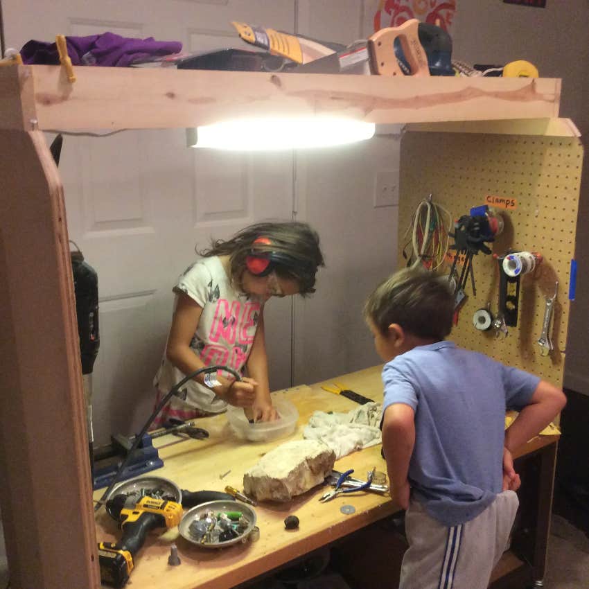 Kids using tools in homemade cave