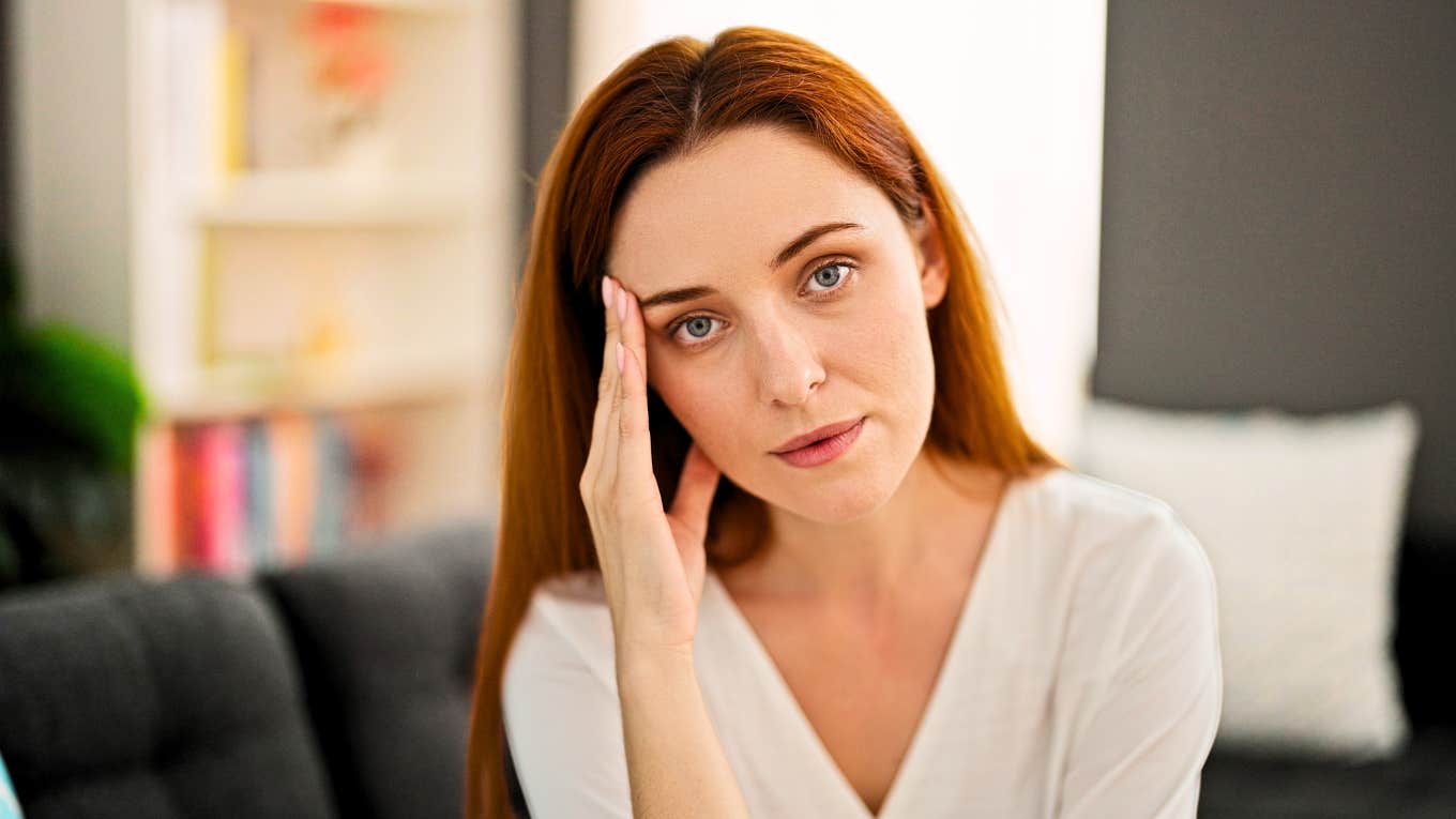 Worried woman unsure if marriage can survive infidelity.