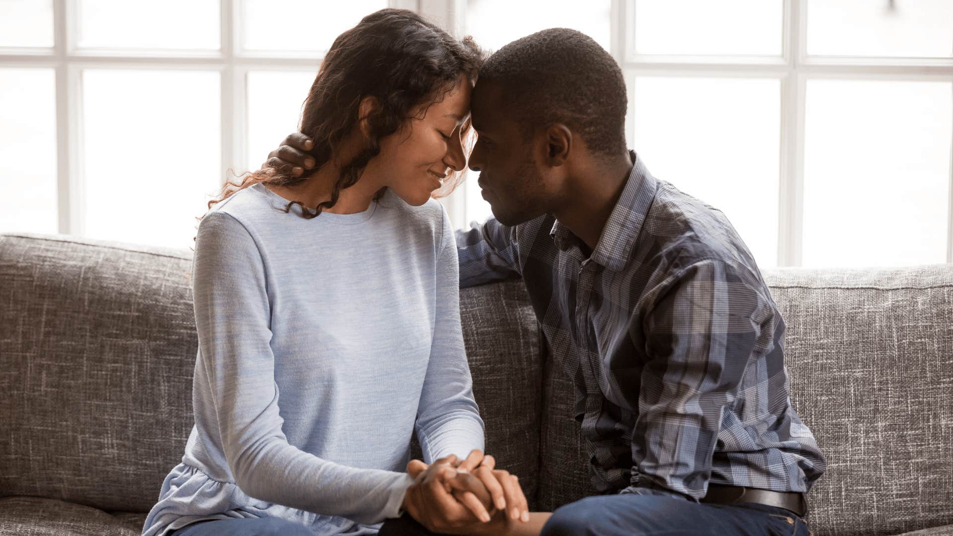 couple sitting on couch