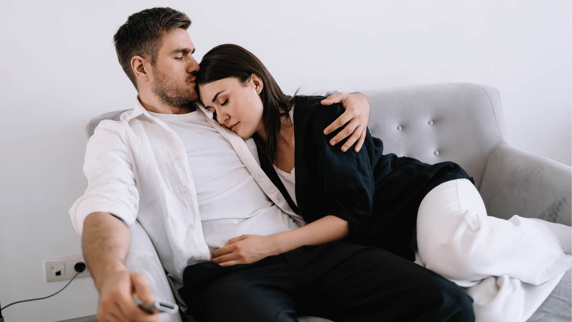 couple sitting on couch