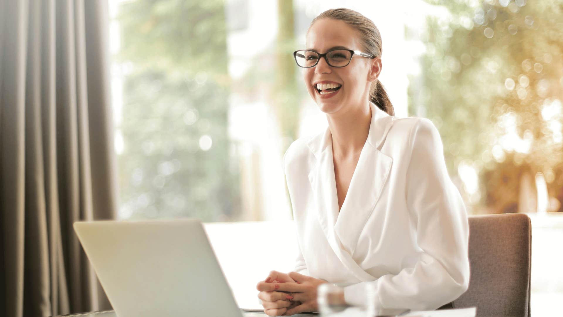 woman working and smiling 