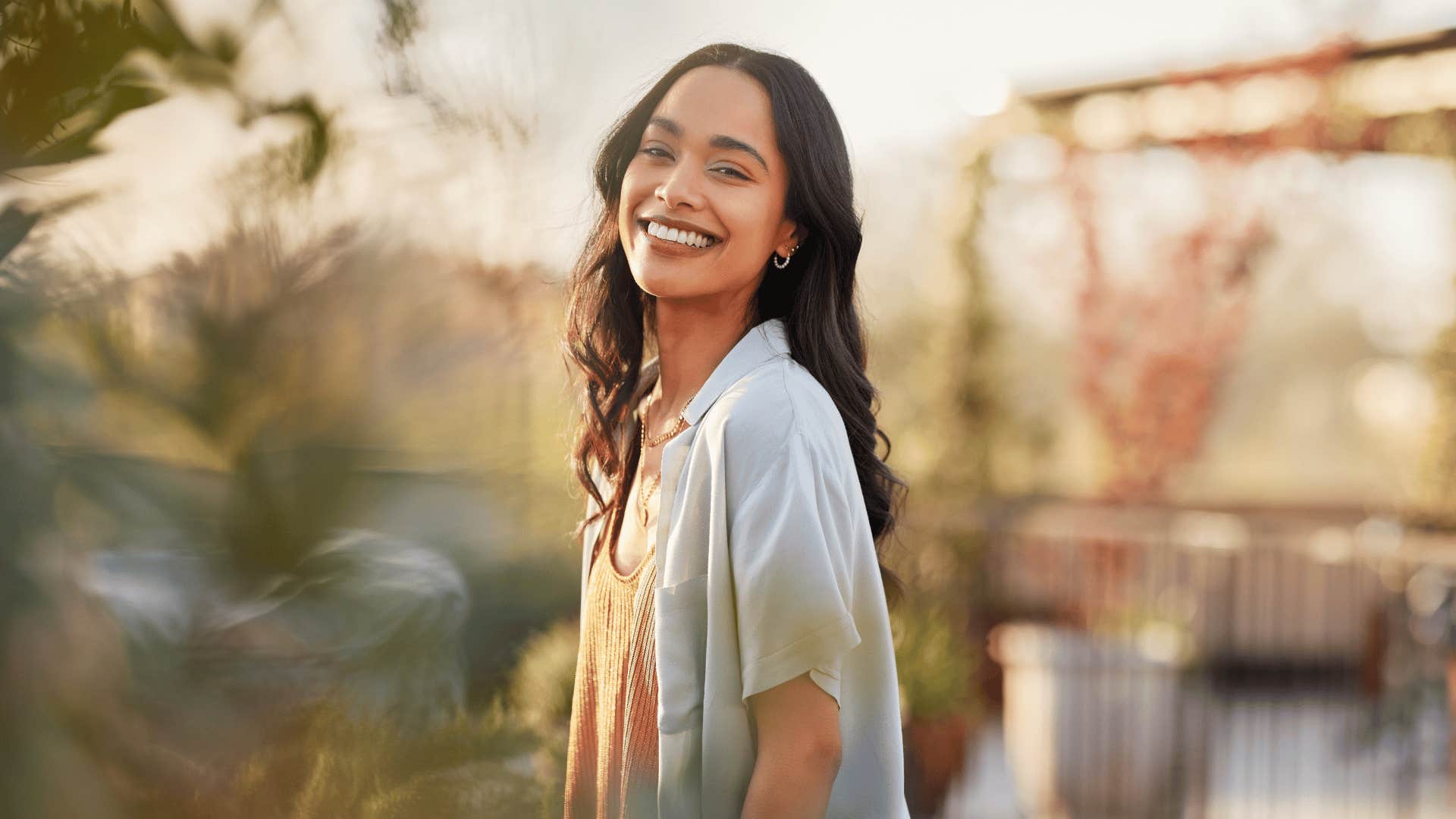 woman outside smiling at camera