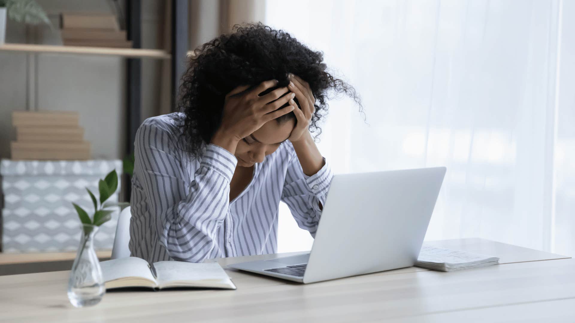 stressed out woman at computer 