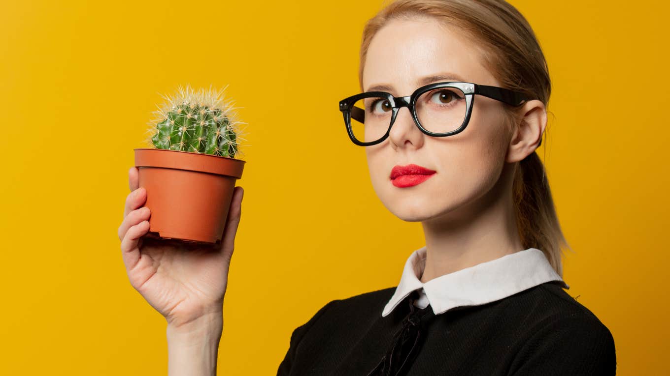 Woman holds a cactus and finds out her man is one.