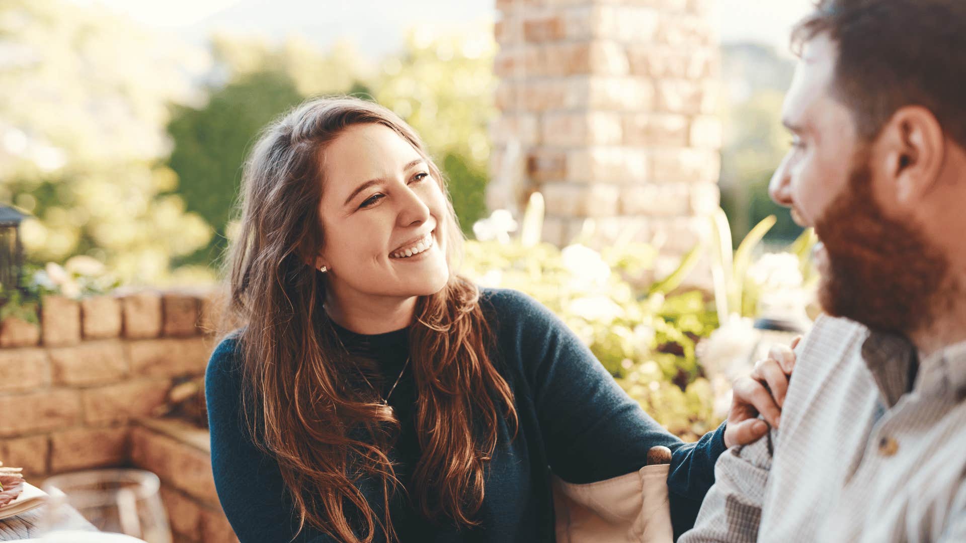 man and woman talking 