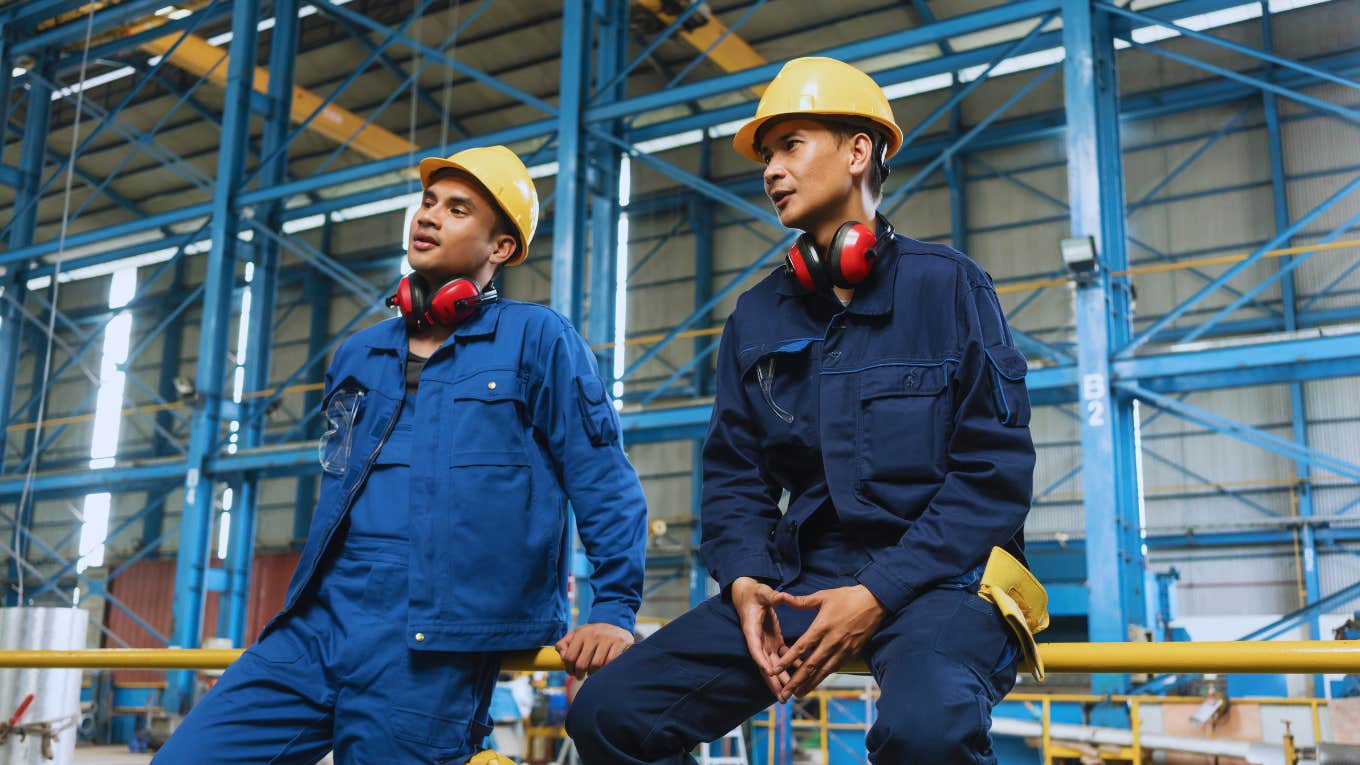 two tradesman talking before work starts