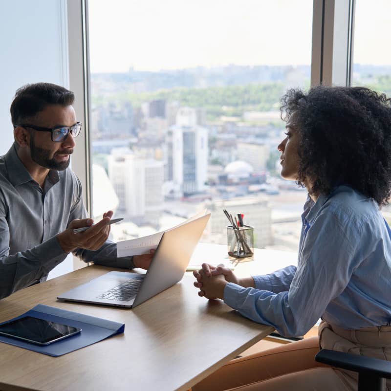 employees having meeting in office