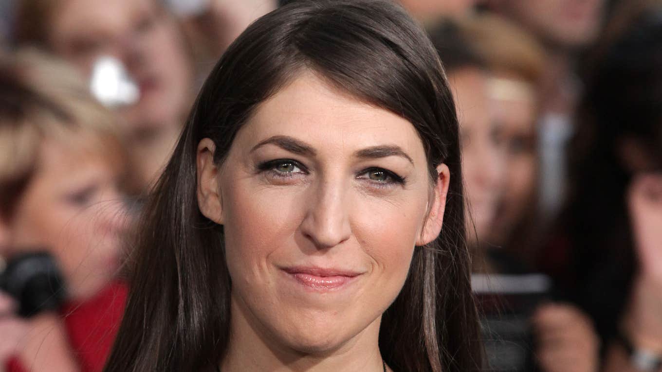 Mayim Bialik with a slight smile