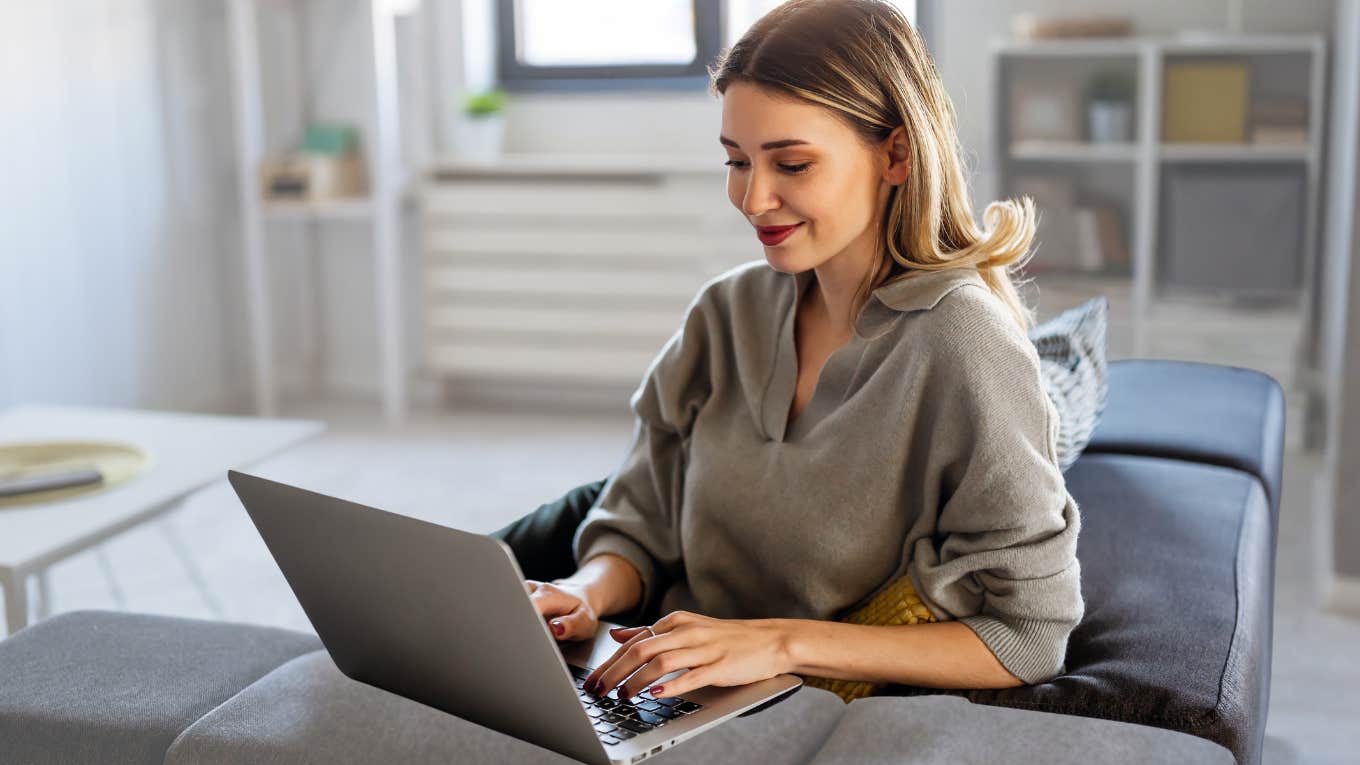 Woman working in her home office while her kids share a room. 