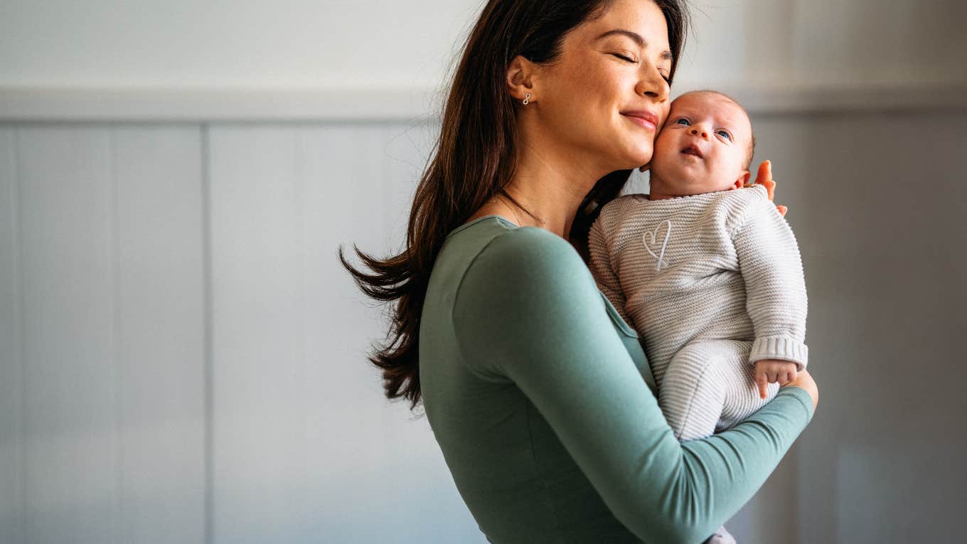 mom holding her newborn baby