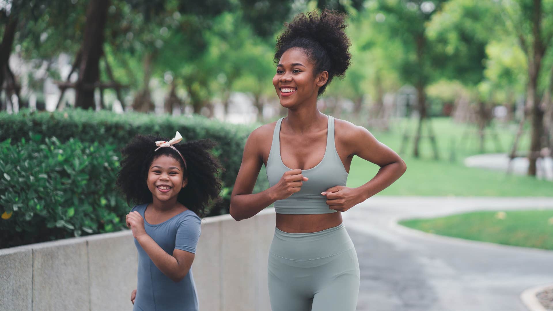 Mother and child jogging joyfully, embracing the universe