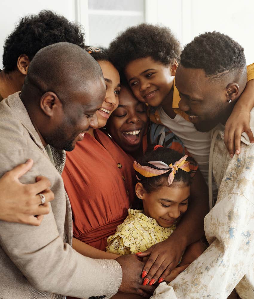 extended family in a big group hug