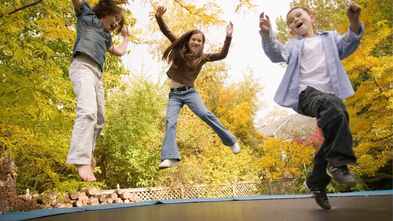 kids jumping on trampoline