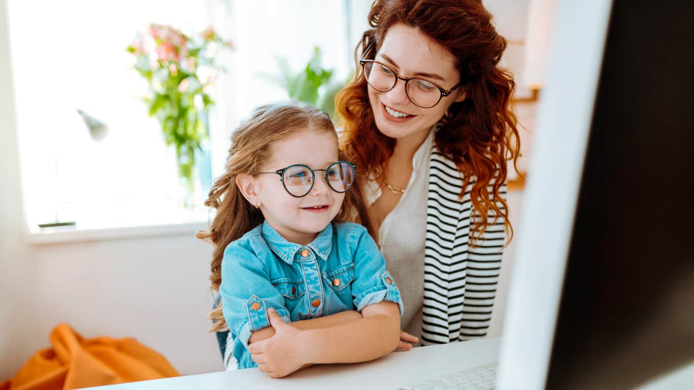 Mother and Neurodivergent daughter doing homework together, back to school