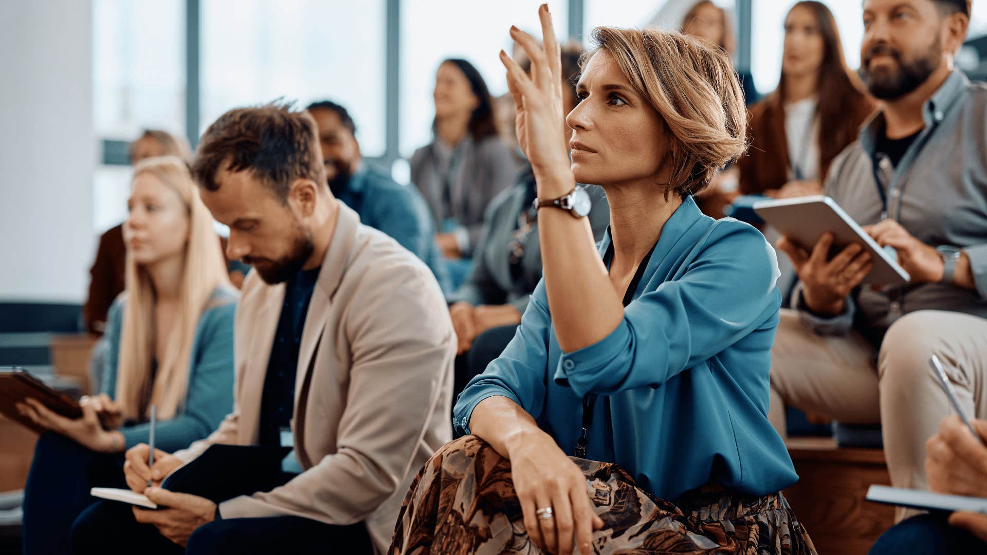 woman asking a question