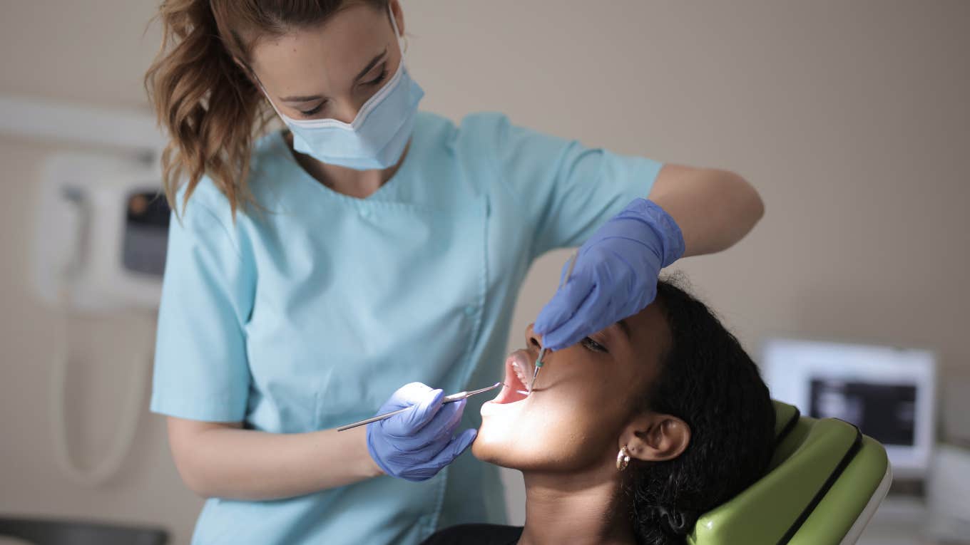 dental patient with hygienist