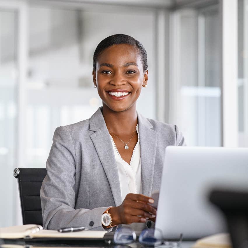 Woman wearing professional attire at work