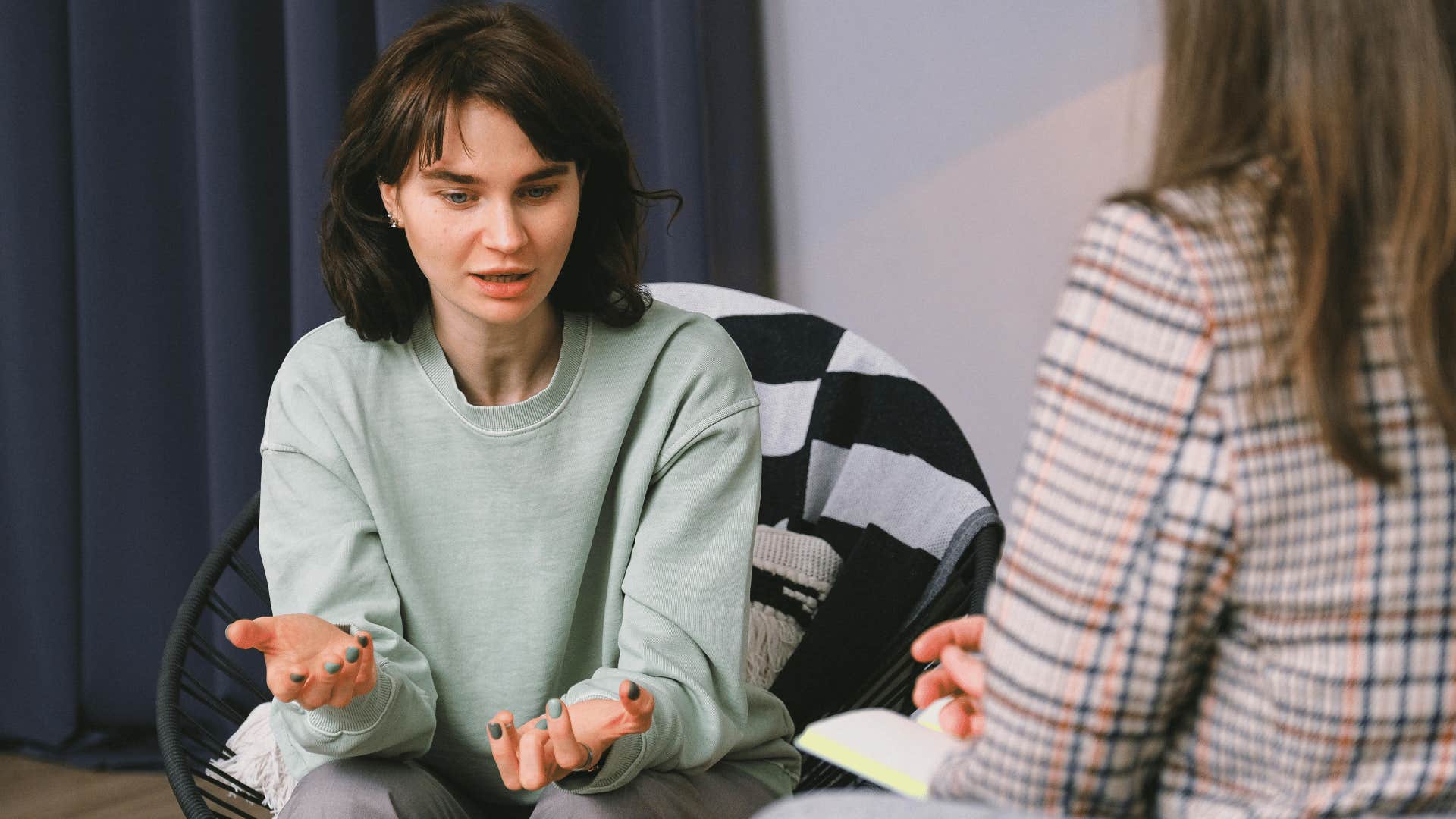 woman speaking trying not to blame her