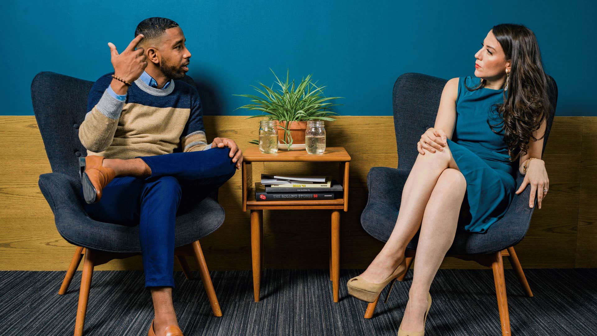 man and woman debating calmly