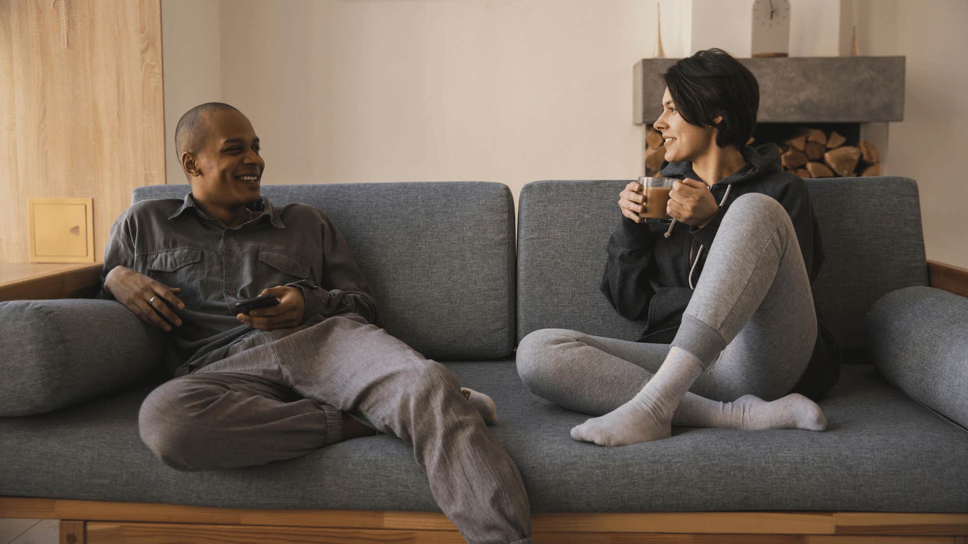 couple chatting sitting on the couch