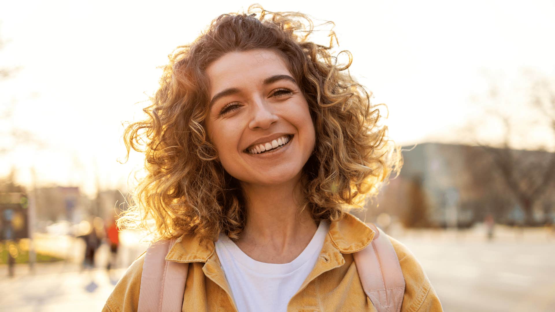 woman smiling outside