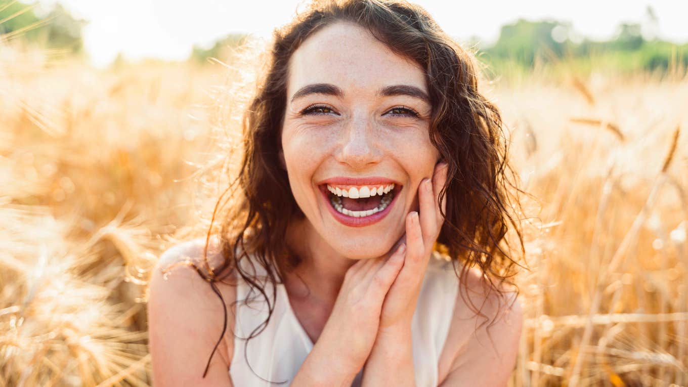 beautiful woman smiling big