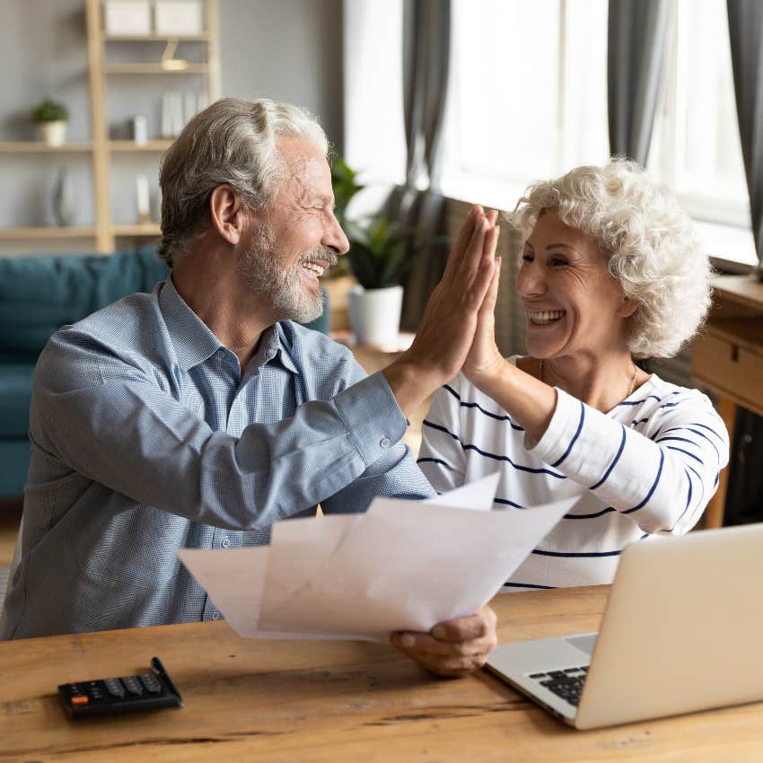 older couple talking about financial retirement goals