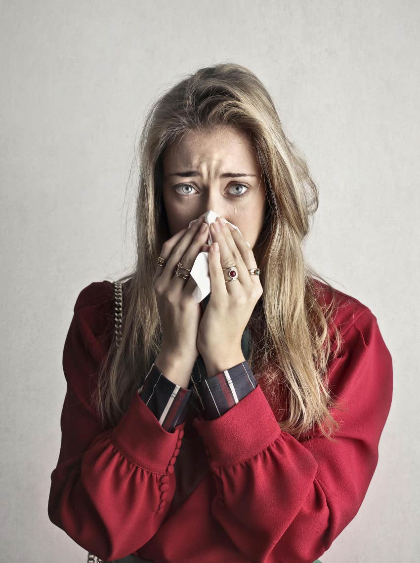 sad woman crying with tissue