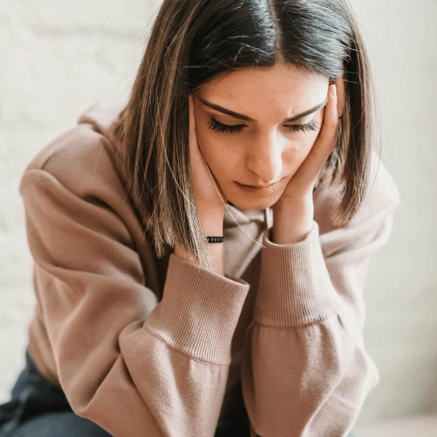 sad woman looking down