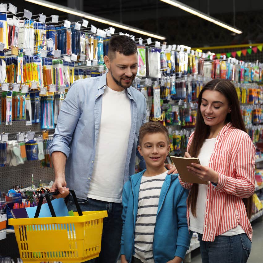 Parents and student shopping for school supplies