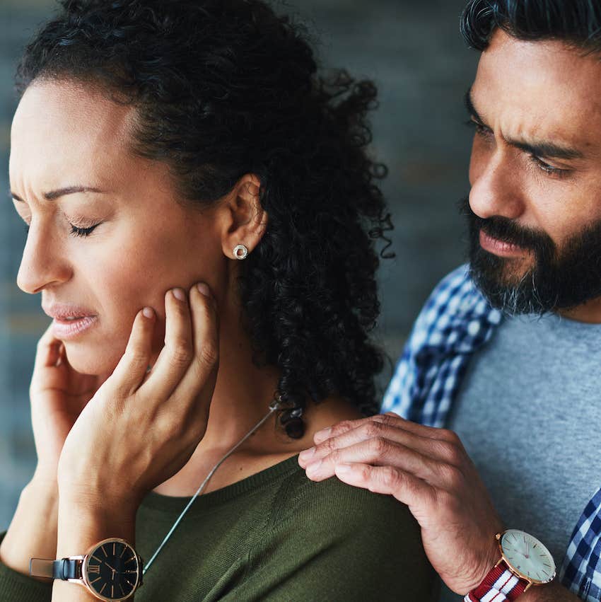 Supportive spouse uses touch to let her know her feelings are not irrational