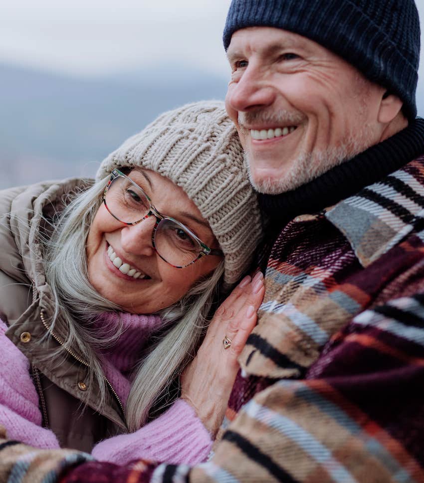 Happy couple hugs after giving a simple compliment