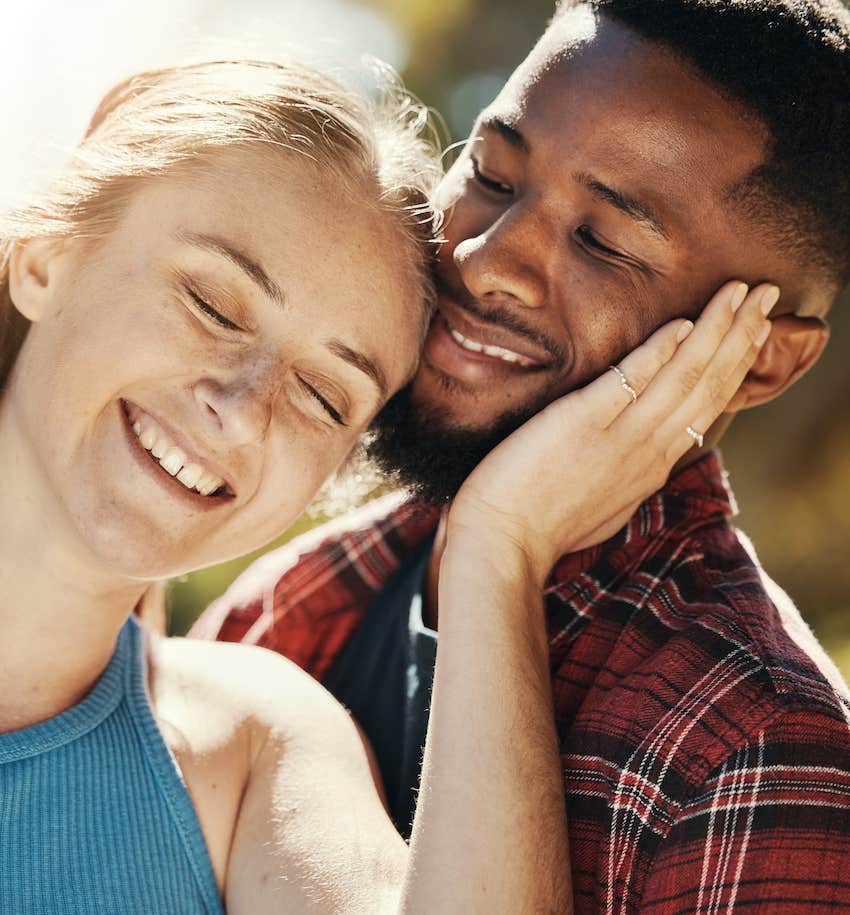 Touching her partner's face shows affection with proven benefits of love