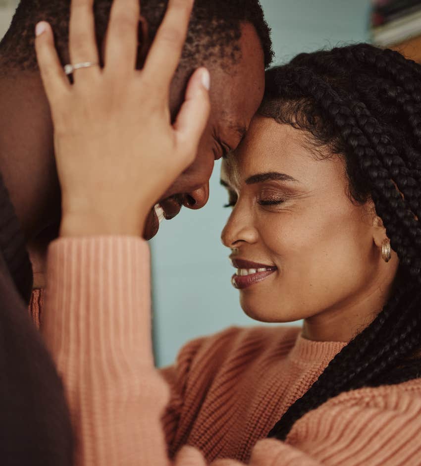 Close couple, forehead to forehead, have a super-romantic marriage