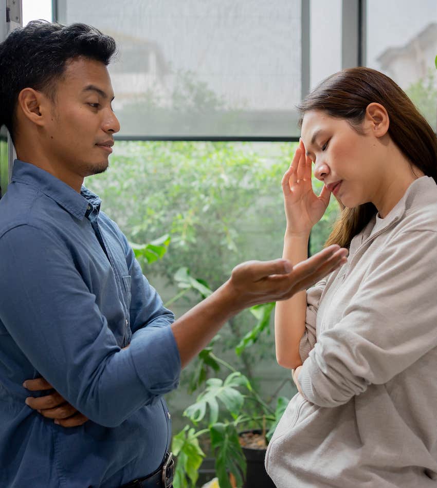 Couple having difficult conversation about wife being happier