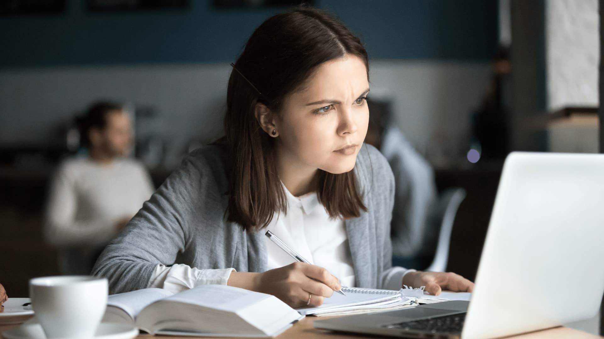 fearless and clever woman working on laptop