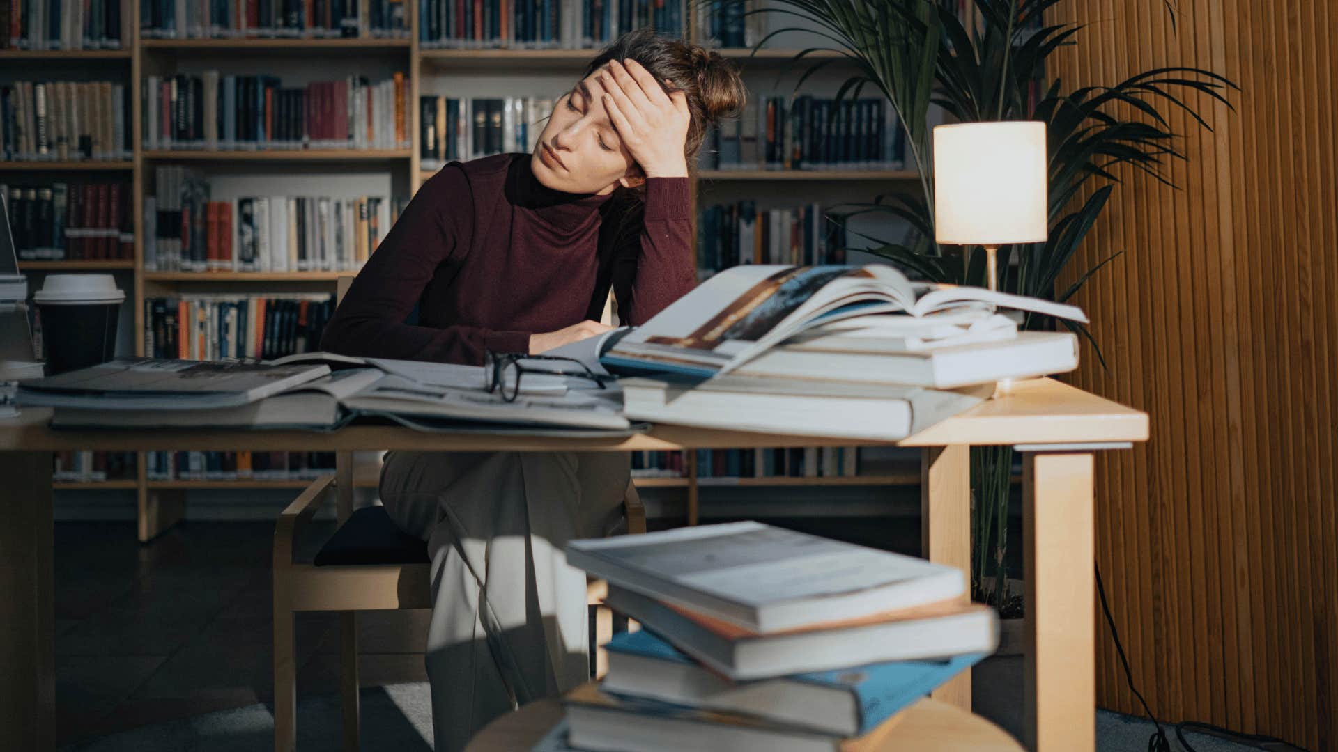 woman looking stressed while working