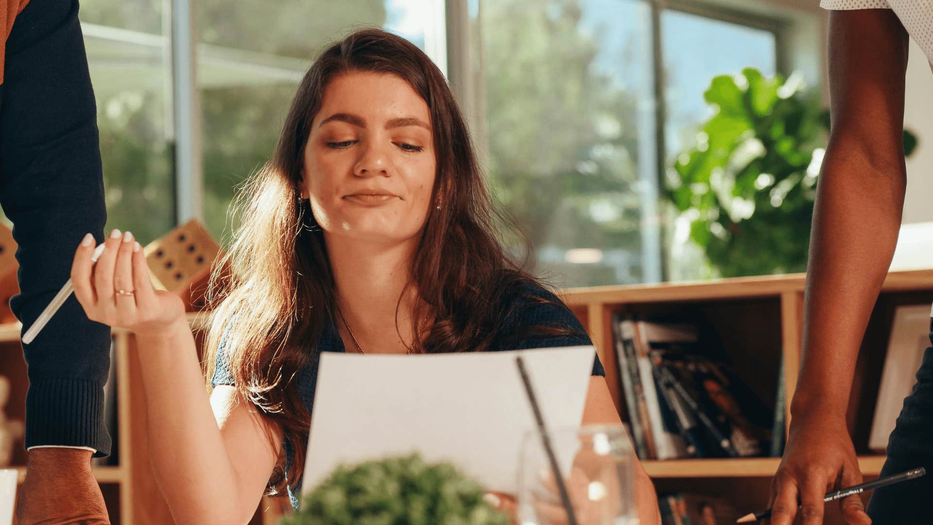 woman grading paper